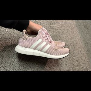 Size 9 women’s adidas shoes. Good shape.